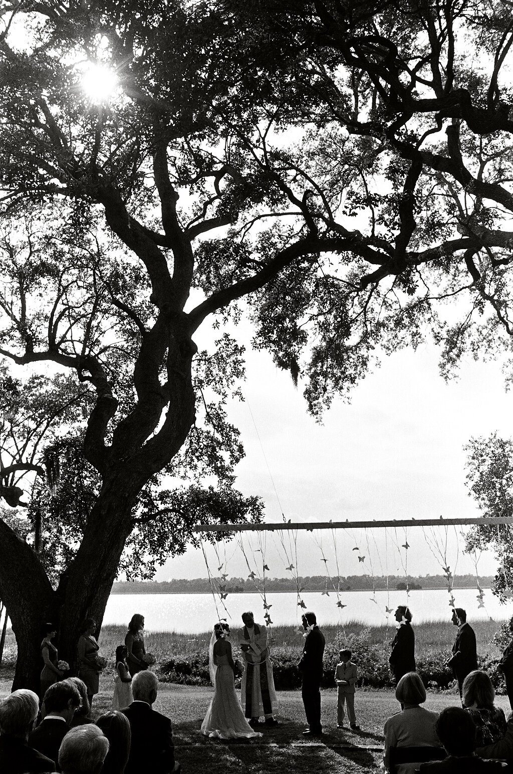 A beautiful setting for a wedding ceremony on the Ashley River in Charleston, SC. Planning by Tara Guérard #lowndesgrove #riverside #taraguerard #outdoorwedding #informalwedding