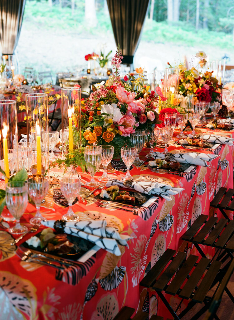 bright-and-vibrant-florals-with-crystal-glass-table-display-tented-wedding
