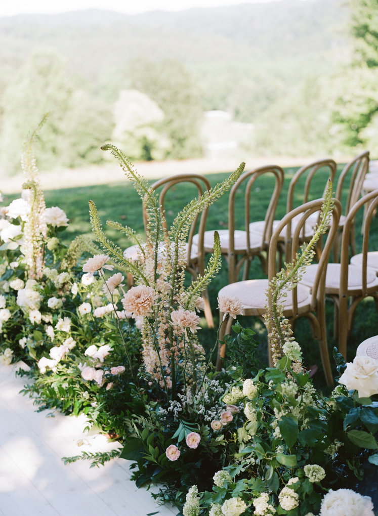 sophisticated-destination-wedding-blackberry-farm-Liz-Banfield-country-tennessee-details-beautiful-quiet-luxury-mindy-rice-floral-jennifer-laraia-wood-bentchair