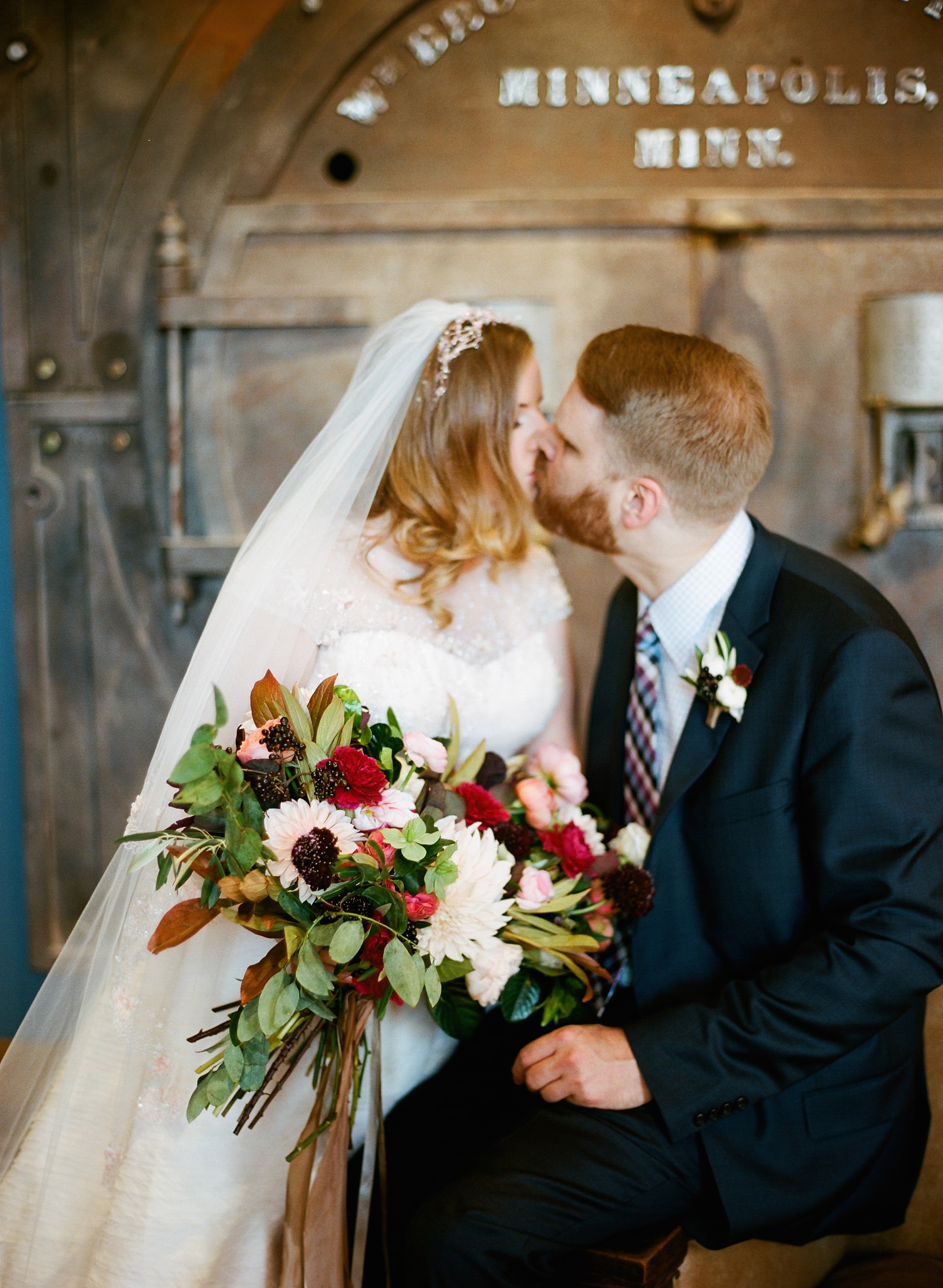 intimate-portrait-of-bride-and-groom-kissing