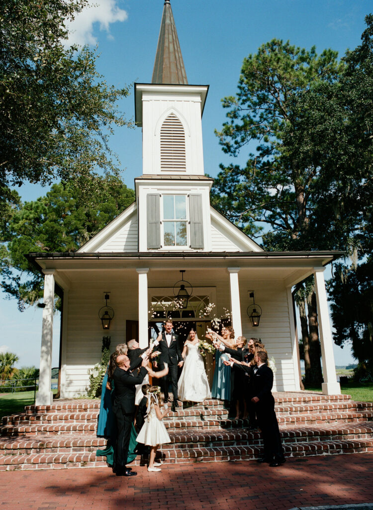 Palmetto-Bluff-chapel-in-Bluffton-South-Carolina-couple-exiting-the-church